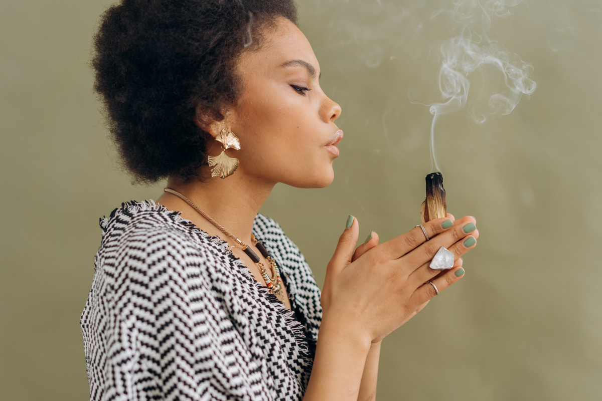 Woman Holding Palo Santo